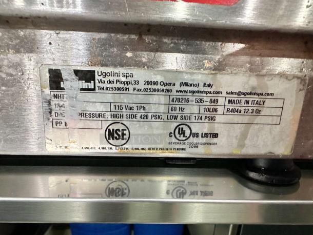 Ugolini NHT2 slush machine label; NSF & UL listed, 115 Vac, Made in Italy. Model details visible, in superior condition.
