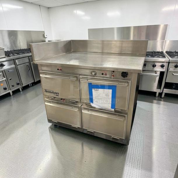 Duke Thermotainer heated holding cabinet in excellent condition, stainless steel, model DUK-L-HLD-0212, fully tested, 208V/3 Phase.