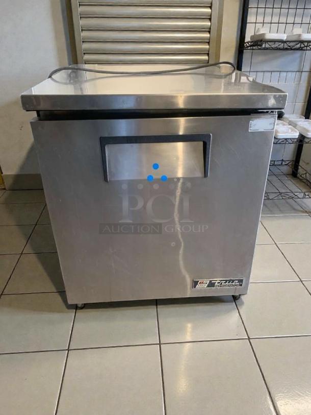 Immaculate True TUC-27-LP undercounter refrigerator, 115V, single phase, fully tested, True Manufacturing Co. label visible.