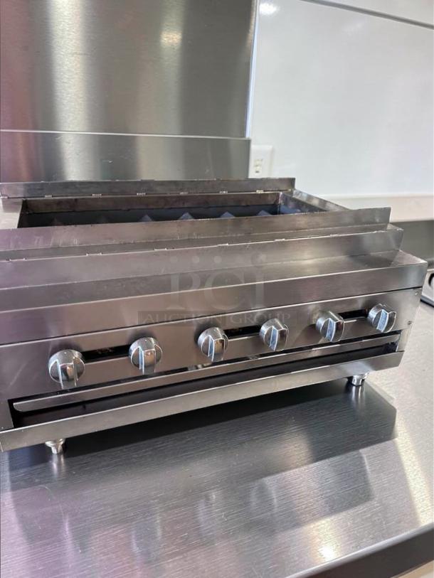 IDEAL 36" Commercial Gas Charbroiler Grill in exceptional condition, features 6 burners, radiant char grill, heavy-duty design.