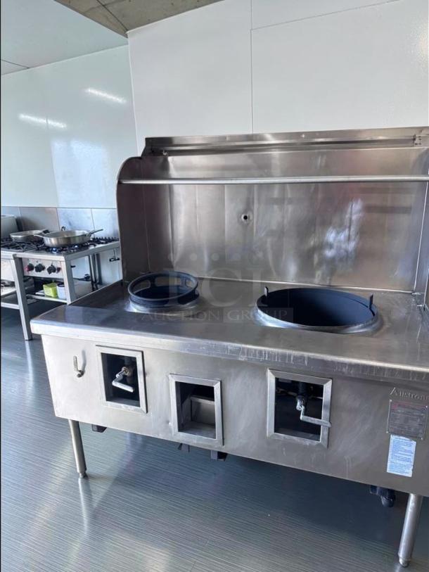 Atosa USA Dual Wok Range in top-tier condition, featuring 2 burners and heavy-duty stainless steel. Model ATO-L-RNG-0695.