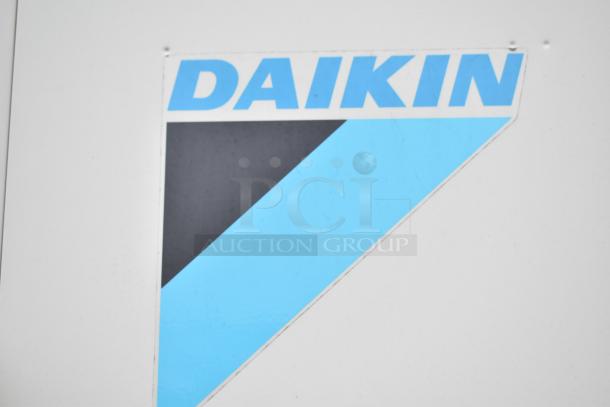 Commercial mobile kitchen trailer featuring CaptiveAire hood, Pitco propane fryers, complete refrigeration; includes Daikin logo.