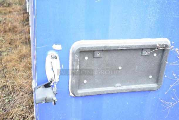 Blue mobile kitchen trailer exterior, visible latch. Features CaptiveAire hood, Pitco fryers, full refrigeration. Moderate wear.