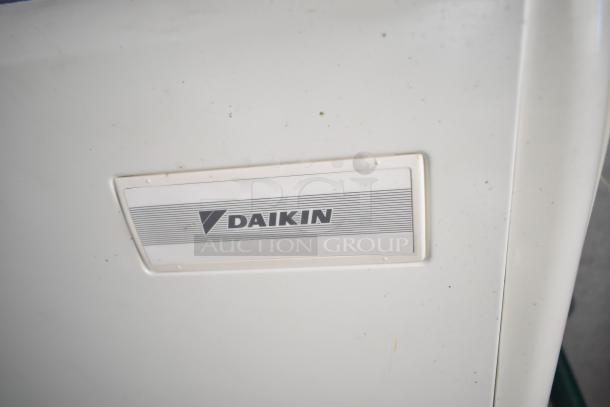 Mobile kitchen trailer with CaptiveAire hood, Pitco propane fryers, complete Daikin refrigeration package, good condition.