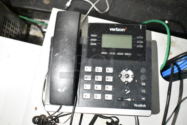 Verizon Yealink T41S business VoIP phone with HD audio, numeric keypad, and function buttons. Shown on a white desk.