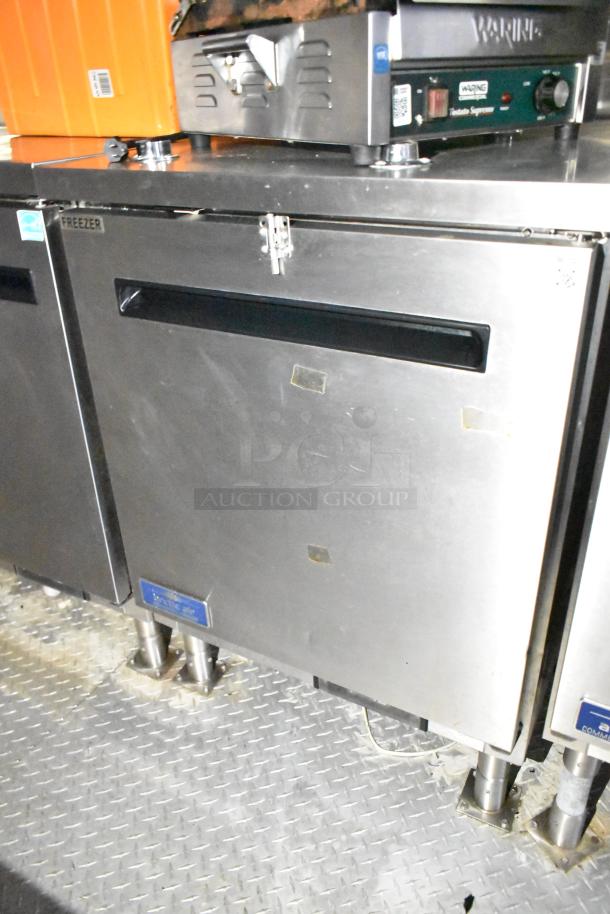 Commercial mobile kitchen trailer with CaptiveAire hood, Pitco propane fryers, and refrigeration. Stainless steel, good condition.