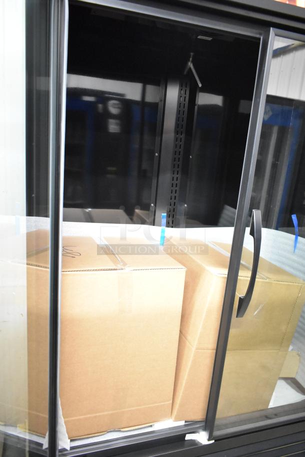 Brand new 2025 True TVM-48SL-HC commercial 2-door reach-in cooler merchandiser, 115V, 1 Phase; slight cosmetic blemishes.