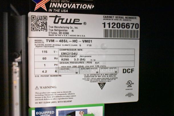 True TVM-48SL-HC cooler label, showing model specs: 115V, R290 refrigerant, EMC3134U compressor, UL listed.
