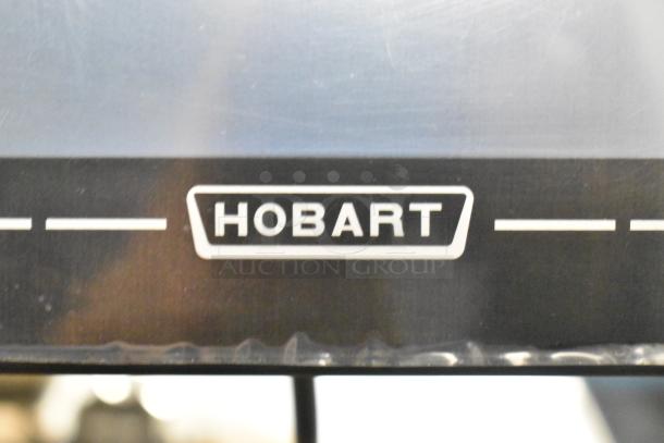 2024 Hobart HTi-7LH4W commercial food scale, tested and working, 120/208-240V, 1 phase, black with Hobart logo.