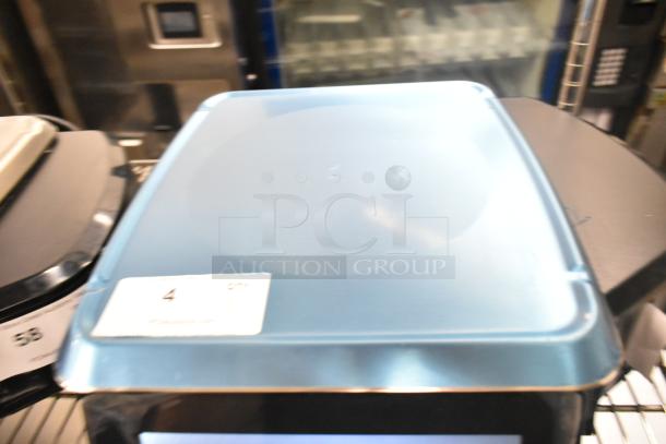 2024 Hobart HTi-7LH4W commercial food scale, tested, working, 120/208-240 volts, 1 phase, displayed on shelf, item tag visible.