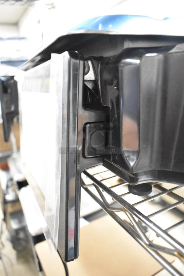 2024 Hobart HTi-7LH4W commercial food portioning scale, black, countertop model. Tested and working, 120/208-240V, 1 phase.