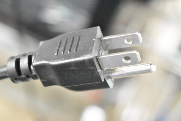 Close-up of a black power plug for the 2024 Hobart HTi-7LH4W Commercial Countertop Food Portioning Scale.