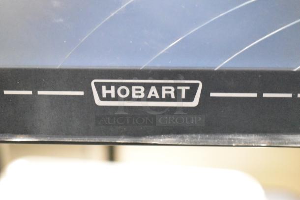 Hobart HTi-7LH4W scale, screen damage visible, 120/208-240V, 1 phase, tested and working, Hobart logo shown.