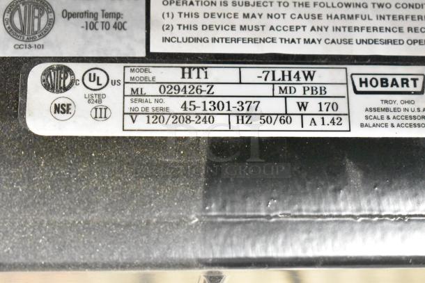 Hobart HTi-7LH4W commercial scale label, 2025 model, 120/208-240V, 1 Phase, tested, screen damage noted.