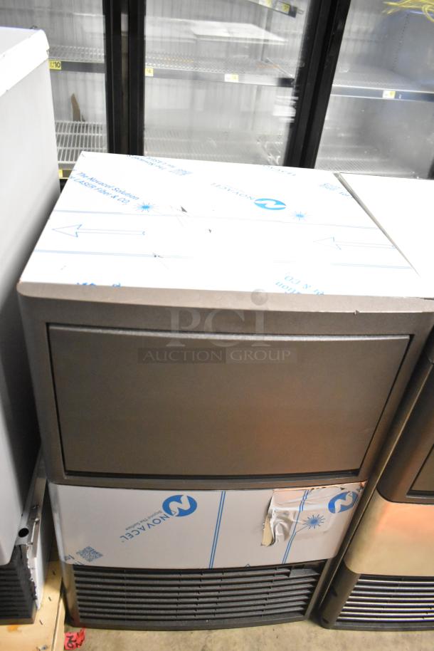 Brand new Manitowoc UDP0065A-161 commercial ice machine, undercounter, 115 volts, 1 phase, minor scratches on casing.
