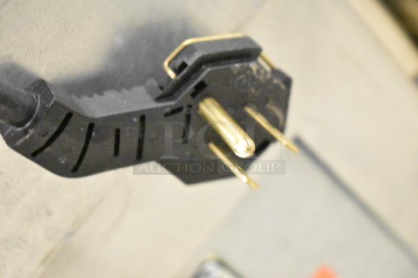 Close-up view of an electrical plug for the 2025 Manitowoc UDP0065A-161 ice machine, 115 volts, 1 phase, brand new condition.