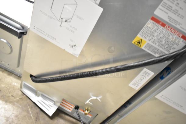 Brand new 2025 Manitowoc UDP0065A-161 commercial ice machine, 115V, 1 phase, undercounter design, visible safety labels.