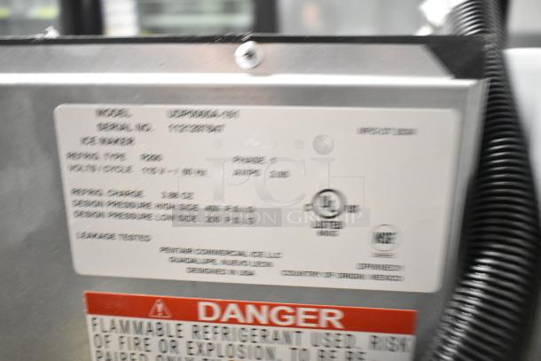 Label close-up of a 2025 Manitowoc UDP0065A-161 undercounter ice machine. Markings show model, serial number, voltage, and warnings.