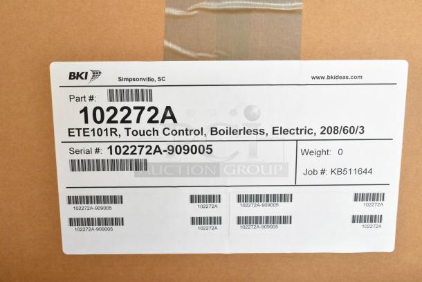 Alt text: BKI ETE101R boilerless combi oven box with label showing part number 102272A, electric, 208V, 3-phase, serial 102272A-909005.