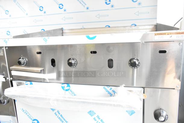 Brand new Vulcan 72SS-6B36GTN commercial range, stainless steel, six burners, 36" griddle, two ovens, 310,000 BTU.