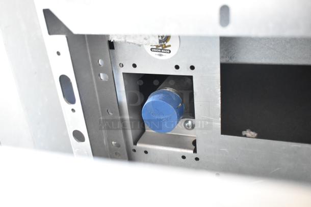 Interior view of Vulcan 72SS-6B36GTN range with visible blue cap and union made label, highlighting construction details.