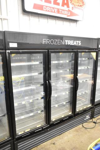 2018 True GDM-72F-HC Commercial 3 Door Reach-In Freezer Merchandiser, excellent condition, visible "Frozen Treats" label.