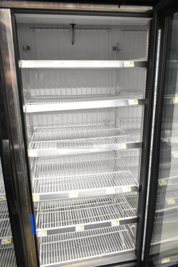 2018 True GDM-72F-HC commercial freezer, 3 glass doors, adjustable shelves, used condition. Electric: 115/208-230V, 1 phase.