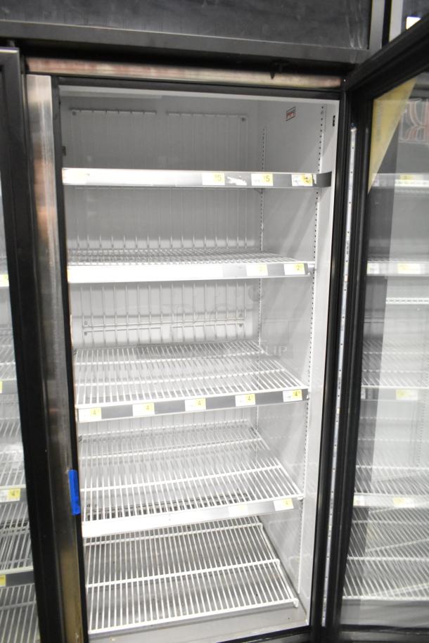 2018 True GDM-72F-HC commercial 3-door reach-in freezer merchandiser in excellent condition, with adjustable shelves.