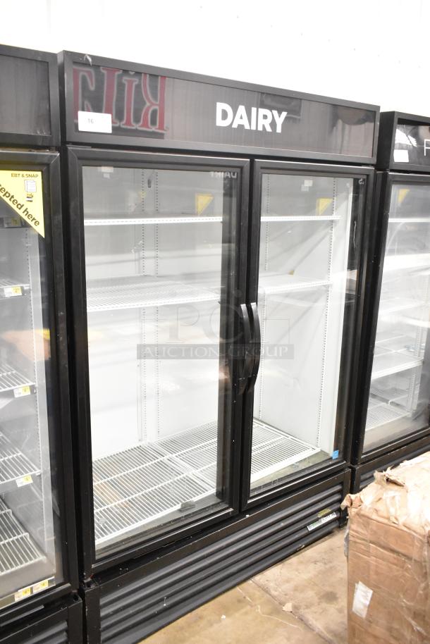 2020 True GDM-49-HC 2 door cooler, 115V, 1 phase. Glass doors, shelves intact, labeled "Dairy." Excellent condition.