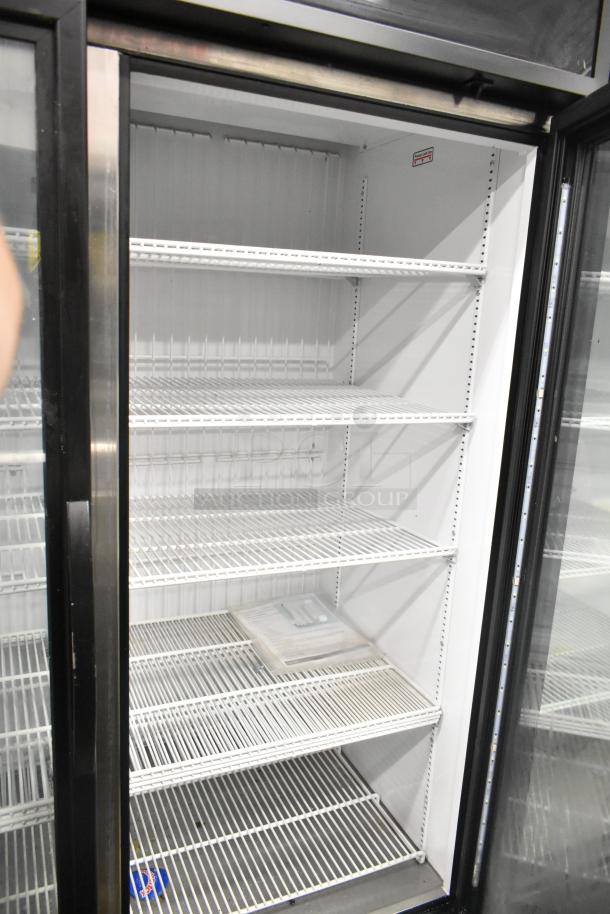 2020 True GDM-49F-HC commercial freezer, 2-door, white interior, wire shelving, excellent condition, 115/208-230V, 1 phase.