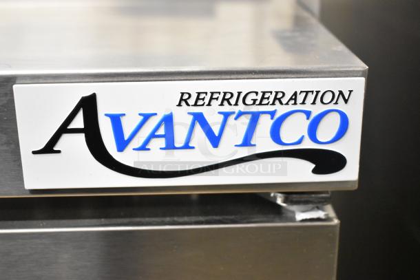 Avantco 178APT48HC logo on commercial salad prep table, stainless steel, brand new with minor scratches and dents.