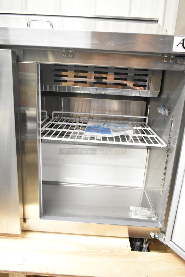 Avantco 178APT48HC Commercial Sandwich Salad Prep Table in stainless steel. Model labeled "scratch and dent." Interior shelves visible.