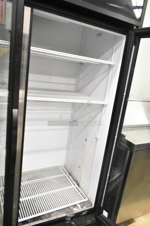 2020 True GDM-49-HC 2 Door Reach In Cooler, commercial, 115V, 1 Phase, shelves intact, needs cleaning.