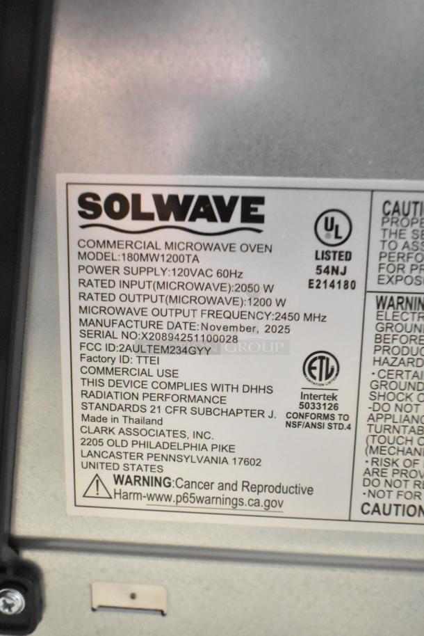 Label on Solwave 180MW1200TA Stackable Commercial Microwave. Shows details like power supply: 120VAC 60Hz, and manufacture date: November 2025.