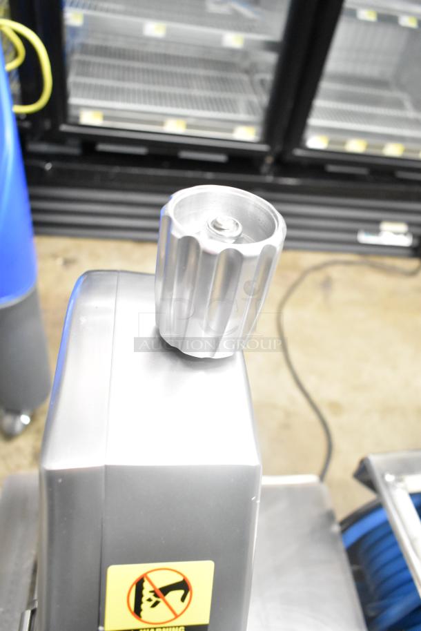 BRAND NEW Backyard Pro 554BSSW65AL vertical band meat saw, 65" blade, warning label visible, 110V, 1 Phase.