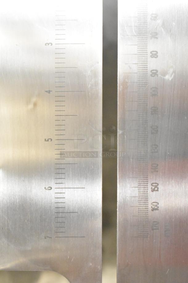 Brand new Backyard Pro 554BSSW65AL Butcher Series 65" vertical band meat saw with ruler markings, 110V, 1 phase.