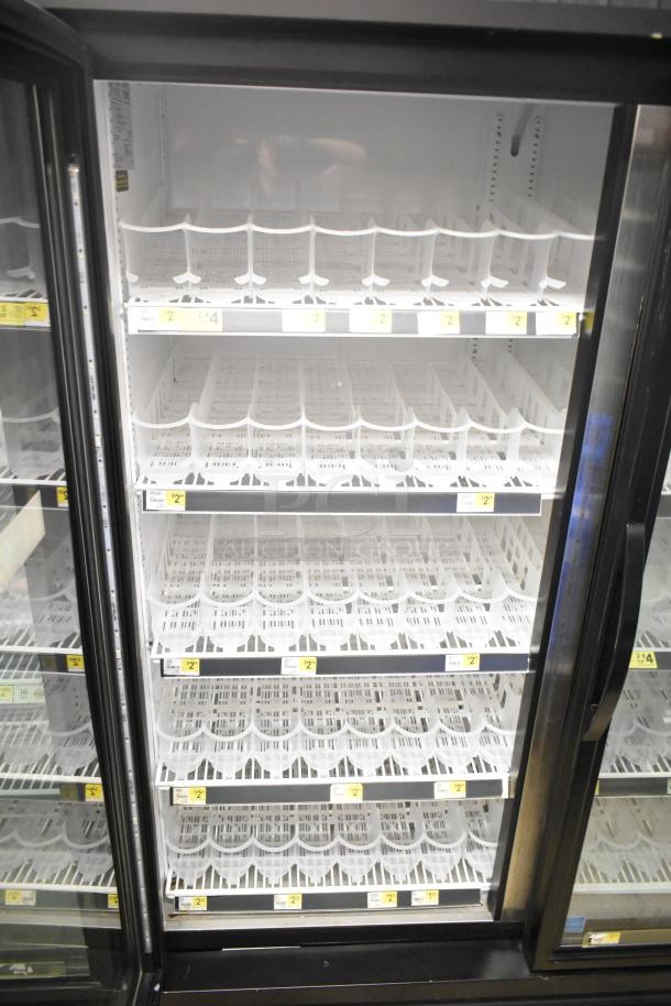 2018 True GDM-49-HC Commercial 2 Door Cooler Merchandiser, shelves visible, used condition, 115 Volts, 1 Phase.