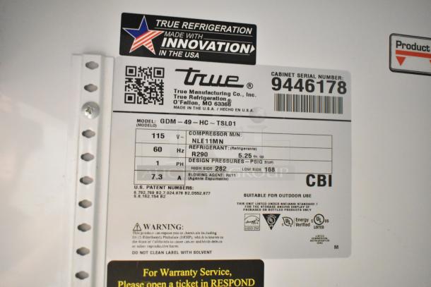 True GDM-49-HC commercial cooler label showing model, 115 volts, 1 phase, compressor details, refrigerant type R290.
