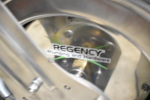 Regency air-water hose reel, brand new, scratch and dent condition. Visible Regency logo on metal reel.