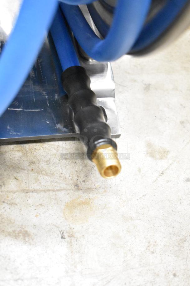 Regency air-water hose on reel, brand new with minor scratches, durable blue hose, brass fitting, metal reel base.