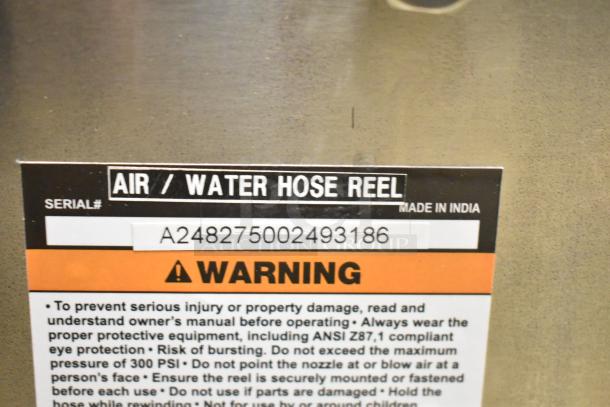 Regency Air-Water Hose Reel, brand new with minor scratches, serial #A248275002493186, made in India. Warning label advises on safety.