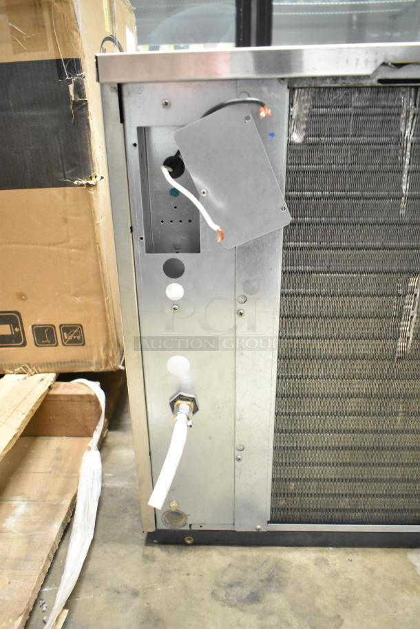 2022 Scotsman NH0522A-1S commercial ice head, 115 volts, 1 phase. Visible wiring and components. Used condition.