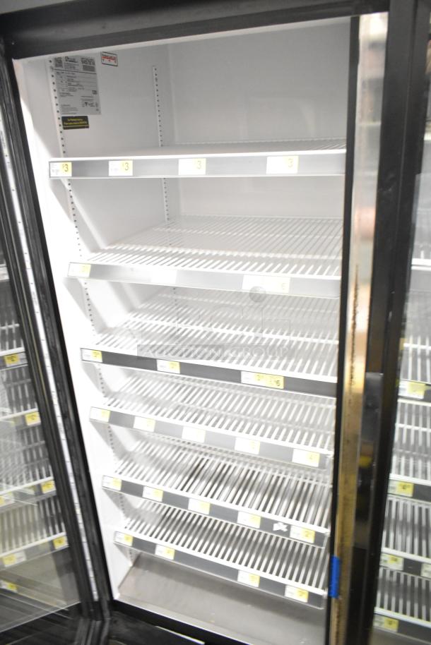 2018 True GDM-72-HC 3 Door Reach-In Cooler Merchandiser, 115V, 1 Phase, excellent condition, shelves intact.