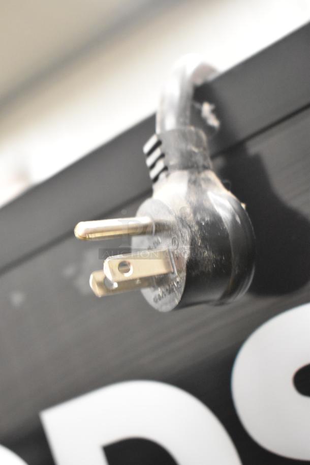 2018 True GDM-72-HC commercial cooler plug, showing the 115V electrical connection.