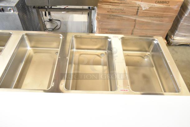 Advance Tabco SW-6E-240-BS Commercial 6 Well Steam Table, 208/240V, 1 Phase, stainless steel, "Caution Hot" label visible.