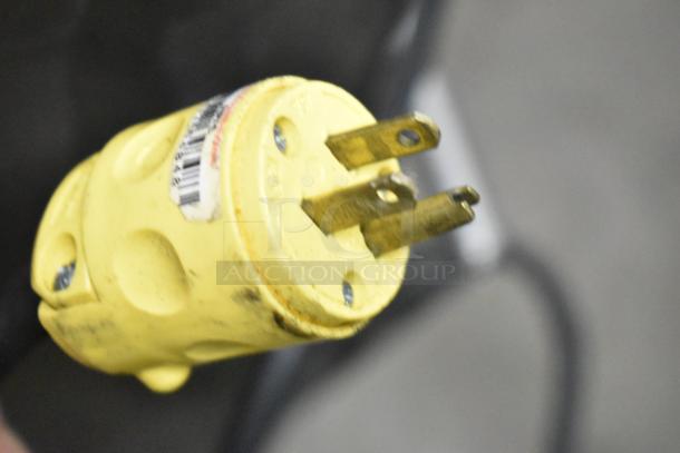 Yellow power plug for JBT Fresh N Squeeze floor-style juicer, 115 volts, 1 phase, visible wear.