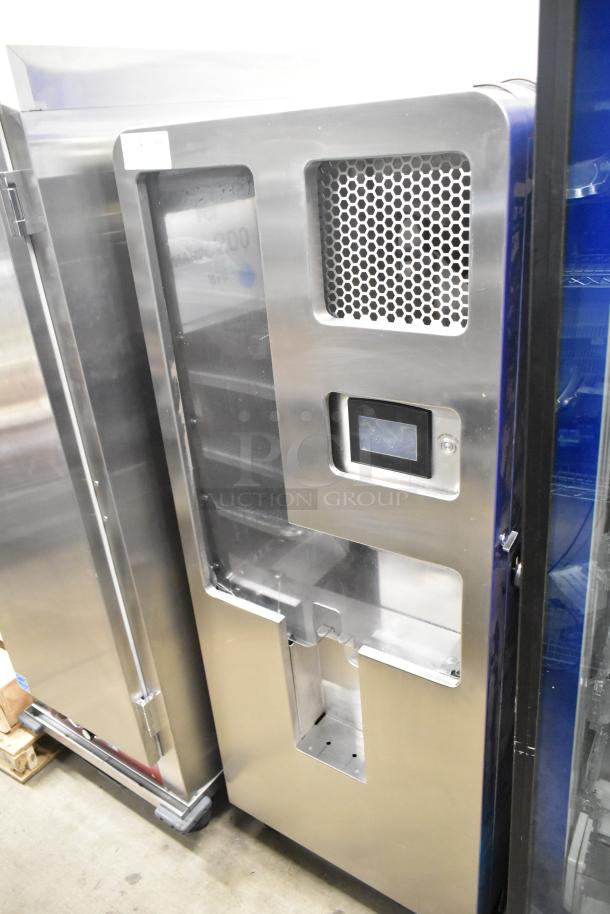 LATE MODEL JBT 2nd-Gen-MFJ-HE citrus juicer on casters. Commercial floor style, stainless steel, 115V, single phase.