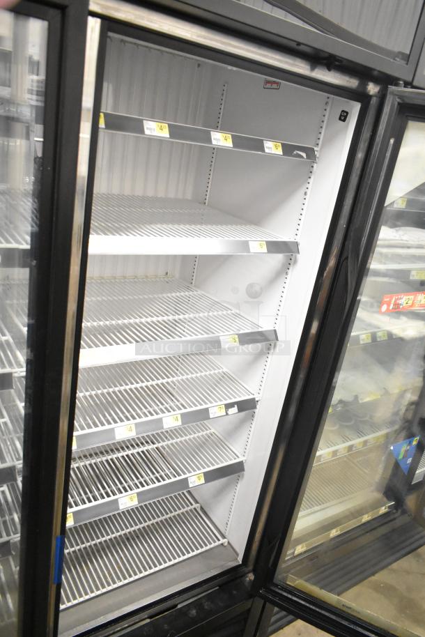 2018 True GDM-72F-HC commercial 3-door reach-in freezer, white interior, stainless shelves, good condition, 115/208-230V, 1 phase.