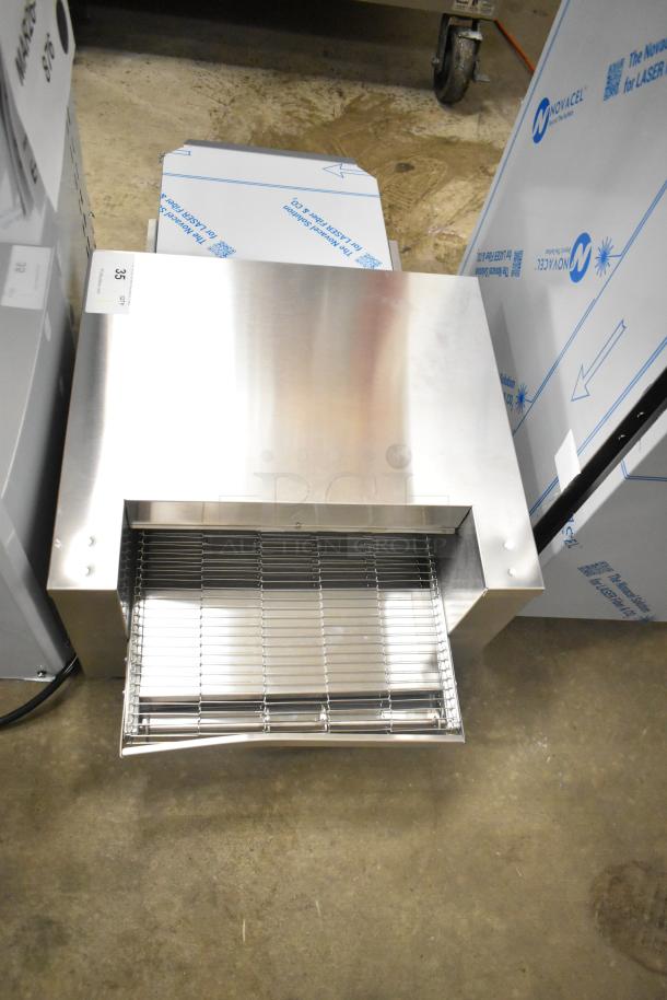 Brand new Vollrath JB3H ventless countertop conveyor oven, 40" with 14 1/2" wide belt, 208V, 1 phase, minor scratches.