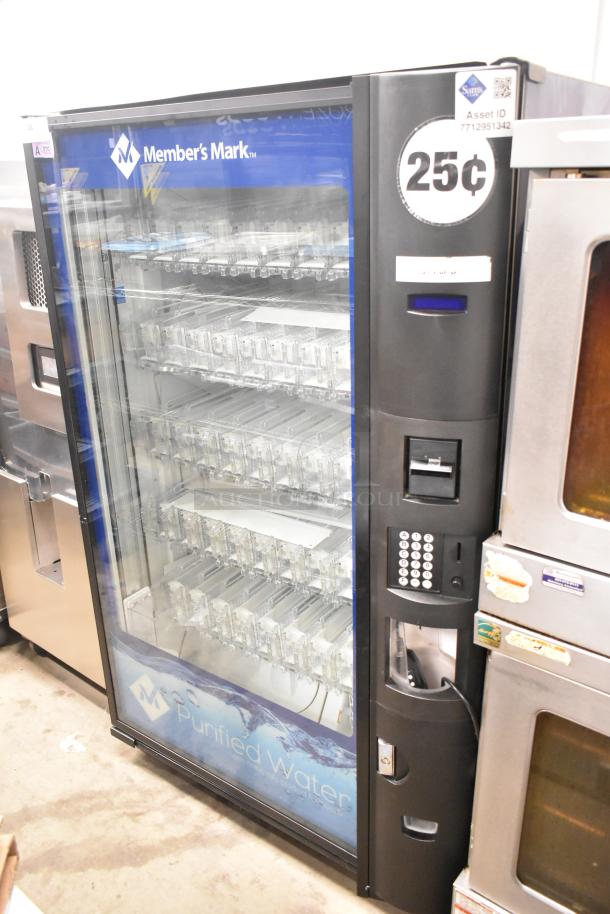 Crane 5800-4 commercial vending machine with bill acceptor, 115V, 1 phase. Features glass front, keypad, and coin slot.